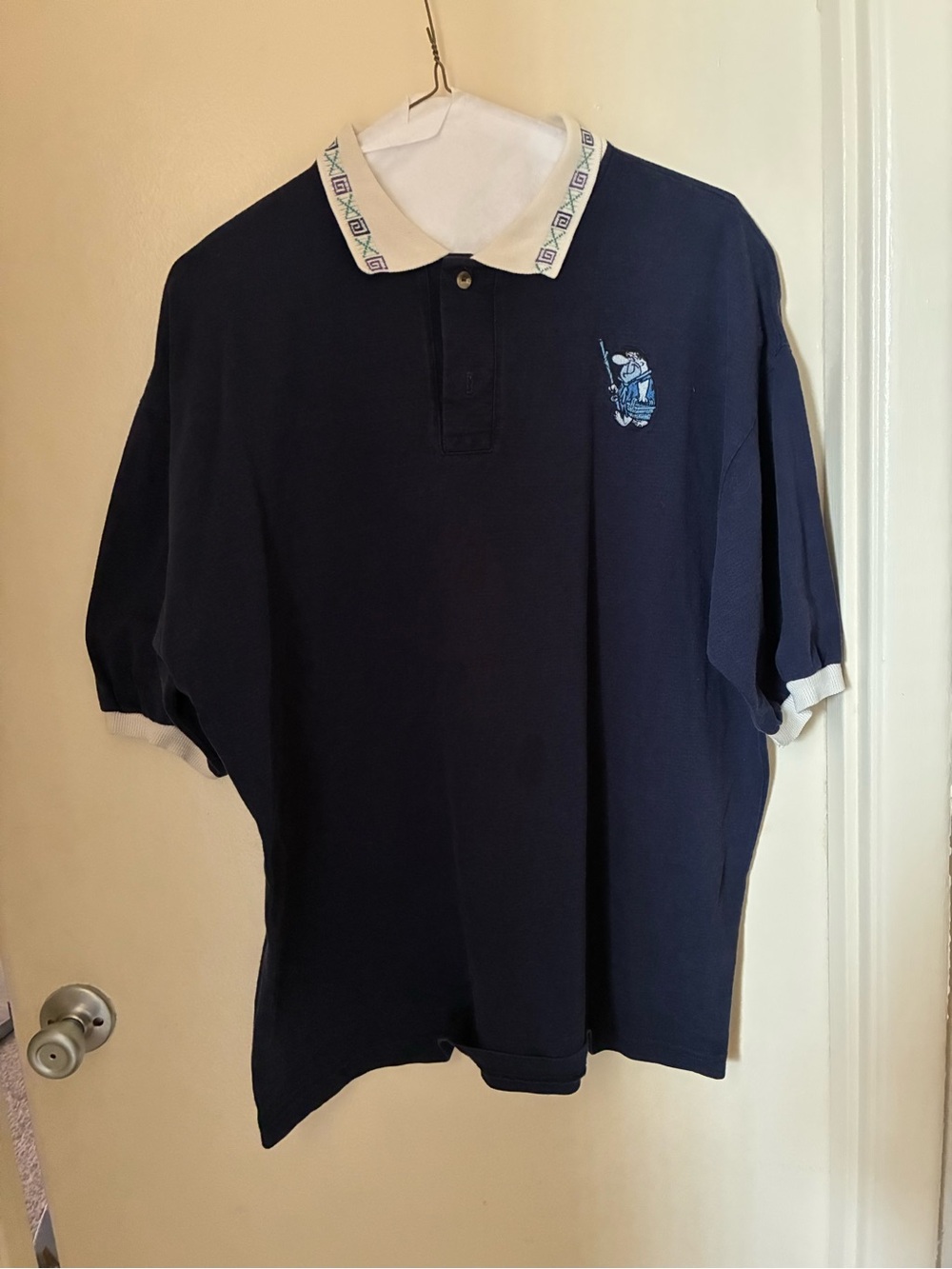 Fred Flintstone Embroidered Navy Polo with White Trim